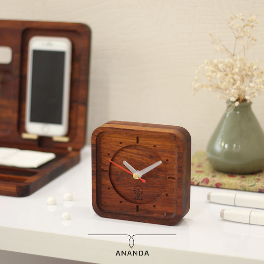 Silent wooden clock with natural iroko frame, perfect for minimal office or home decor.
