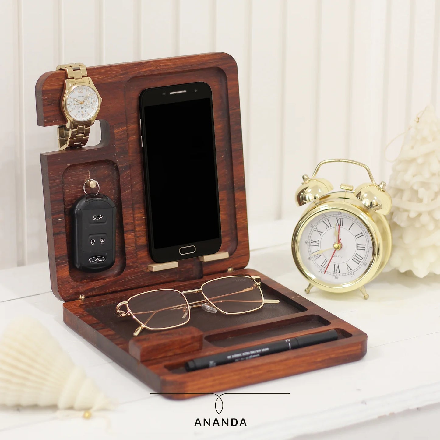 A portable wooden desk organizer , perfect for any workspace. Minimal in size, yet ideal for keeping your daily essentials neatly arranged and within reach iroko wood