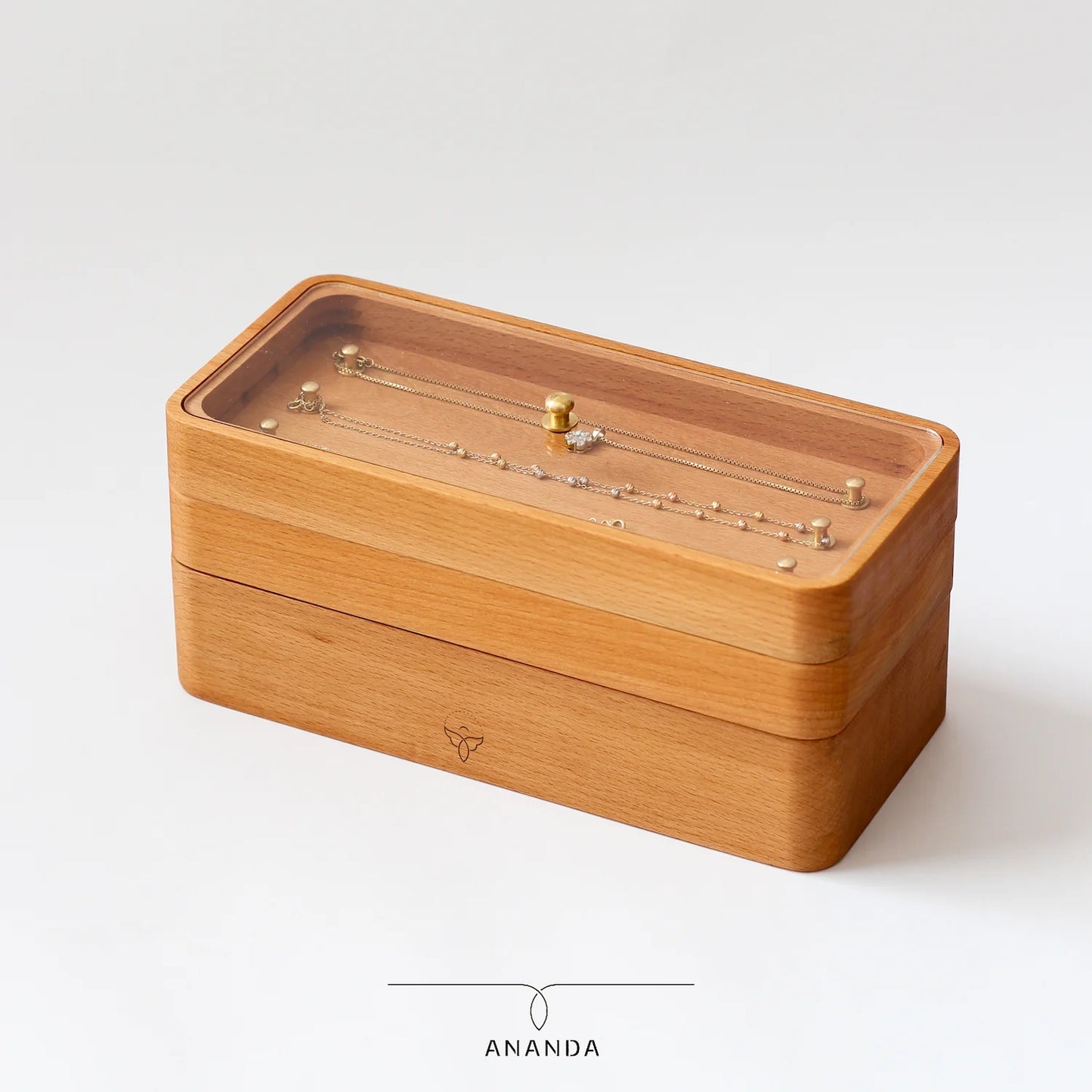 Close-up of top tier with brass hangers for necklaces and pendants – premium jewelry gift box