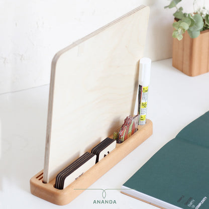 All additional components, including the chalk marker, extra characters, and days, months, and date numbers, neatly stored behind the Hannah perpetual calendar base for easy access and customization.