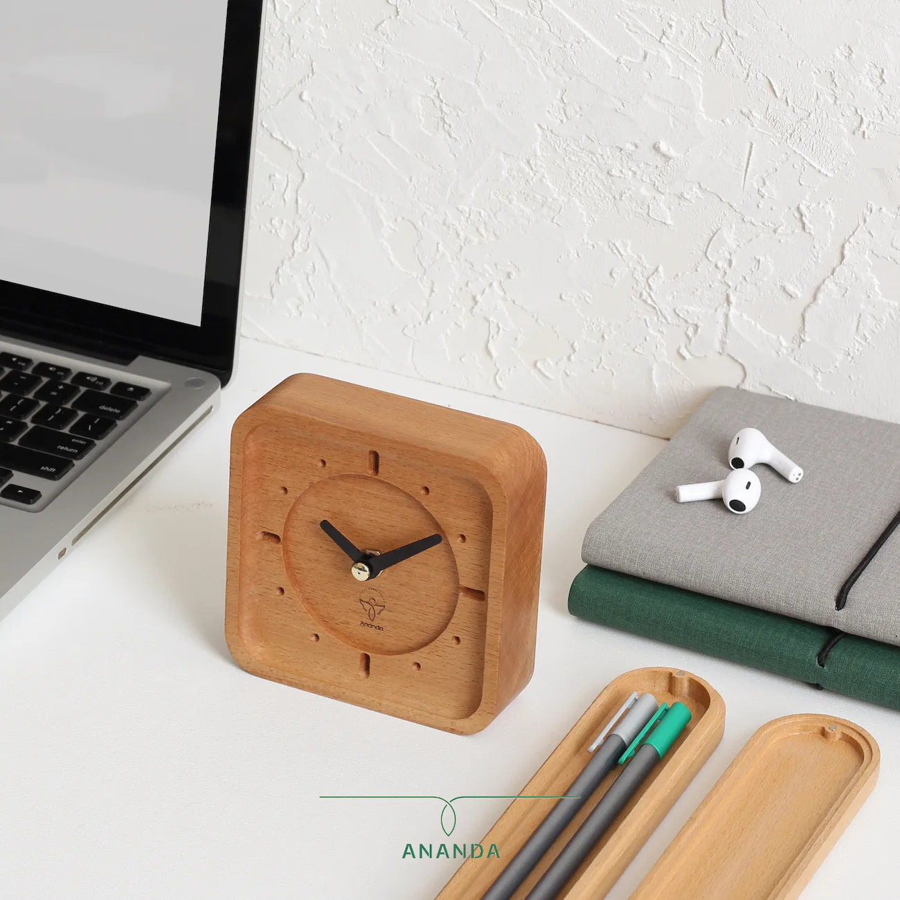Minimal wood desk clock made of solid beech wood, placed on a bright workspace.