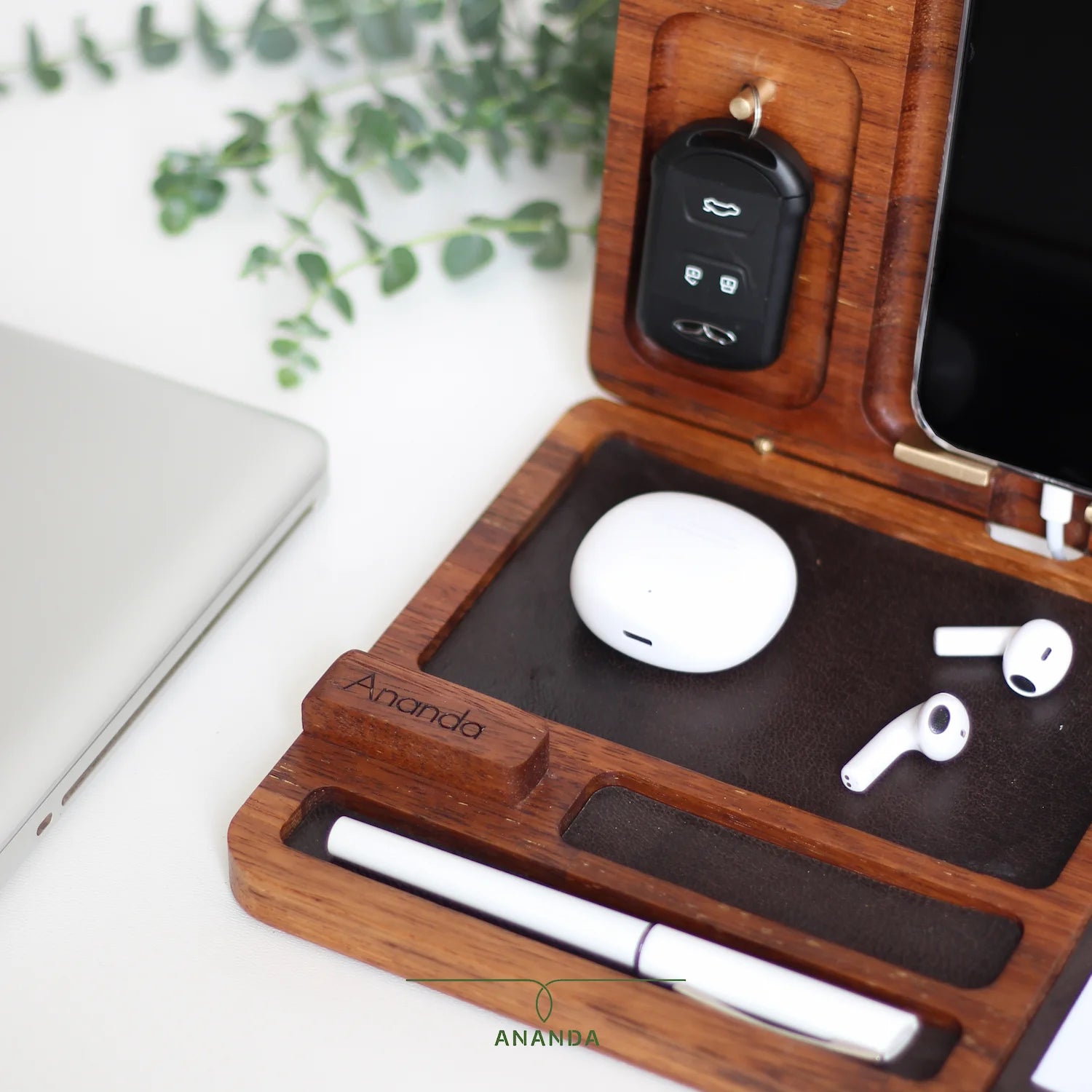  Lifestyle shot of MyOne Big on a work desk with personal accessories inside